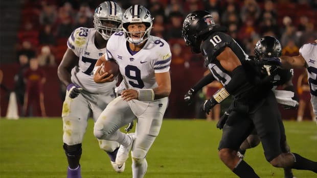 Kansas State quarterback Adrian Martinez runs the ball in the third quarter against Iowa State during a NCAA college football game at Jack Trice Stadium in Ames, Iowa, on Saturday, Oct. 8, 2022.